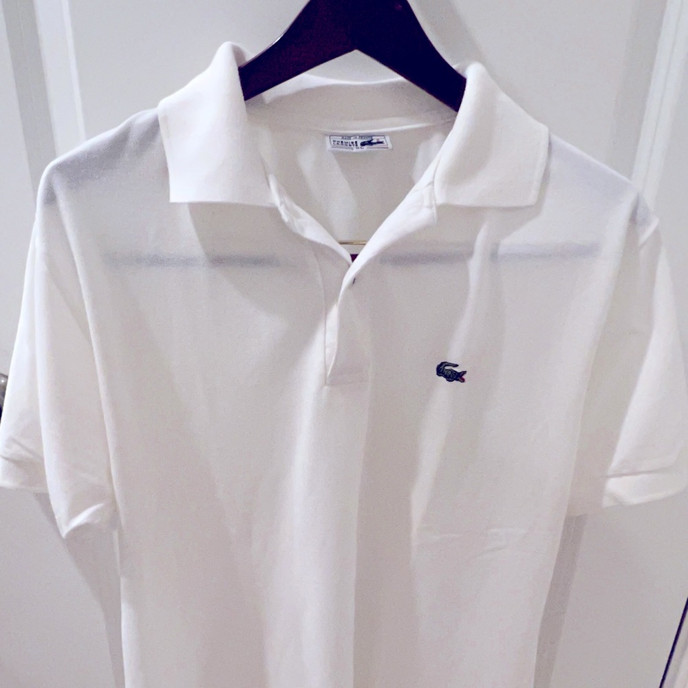 White Lacoste polo shirt. 100% original. Single owner. XL but fits like a large
